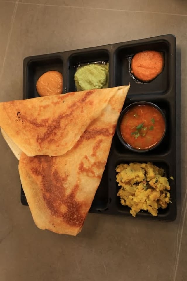 Butter Onion Masala Dosa.
